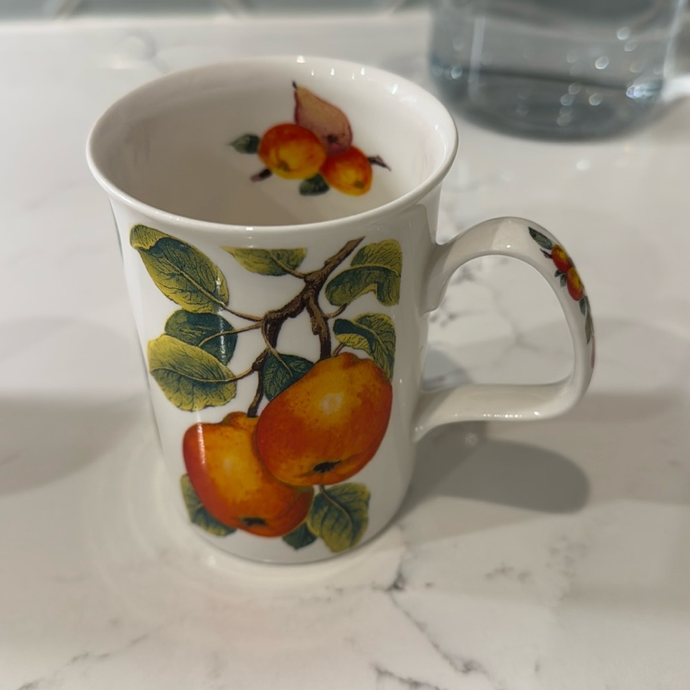 One Roy Kirkham mug. Fine bone china.